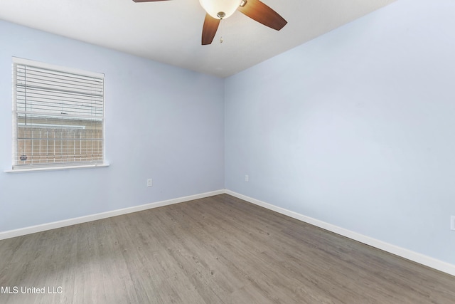 empty room with wood-type flooring and ceiling fan