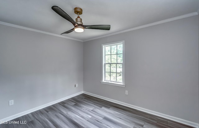 unfurnished room featuring ornamental molding, hardwood / wood-style flooring, and ceiling fan