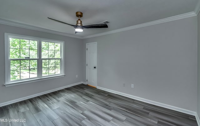 unfurnished room featuring crown molding, wood-type flooring, and ceiling fan