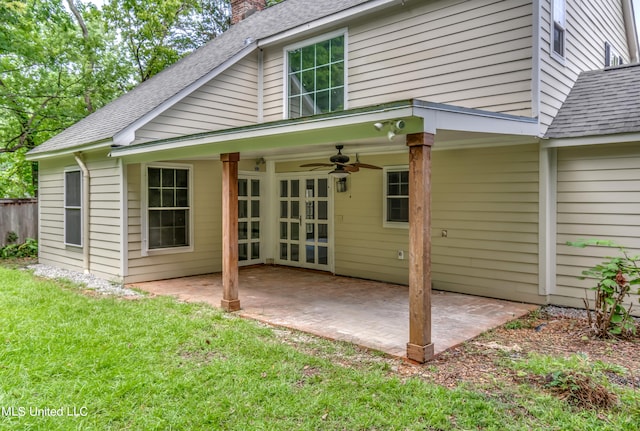 back of house featuring a patio, a lawn, and ceiling fan