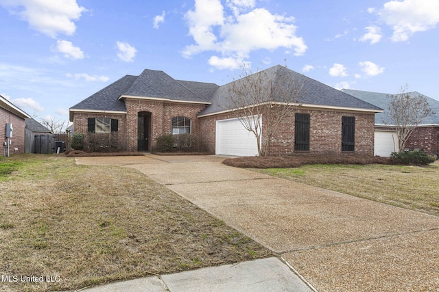 view of front of property with a garage, brick siding, roof with shingles, and a front lawn