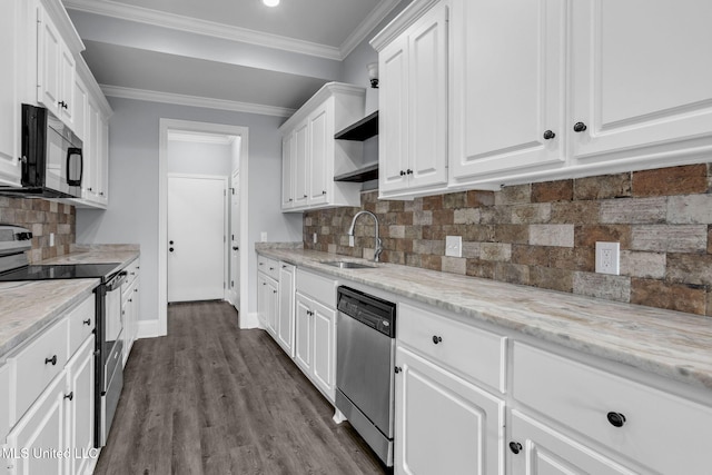 kitchen with stainless steel appliances, a sink, white cabinets, ornamental molding, and dark wood-style floors