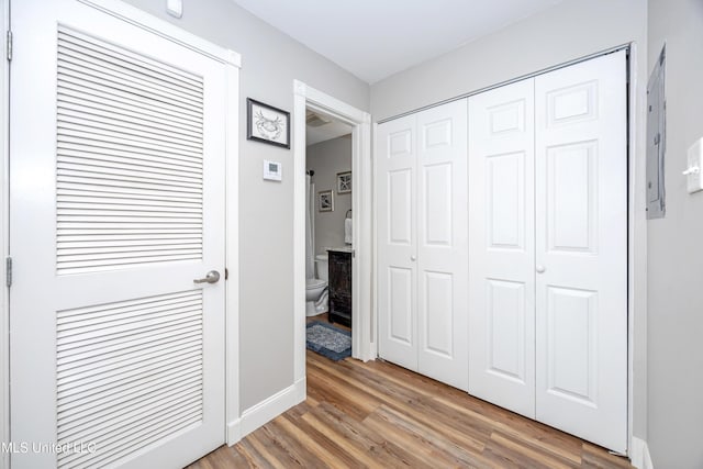 2421 Beachview Dr Unit F16, Ocean Springs, MS 39564 - unfurnished bedroom featuring baseboards and wood finished floors