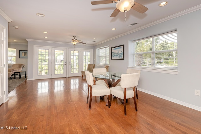 2421 Beachview Dr Unit F16, Ocean Springs, MS 39564 - dining space featuring french doors, baseboards, and ceiling fan