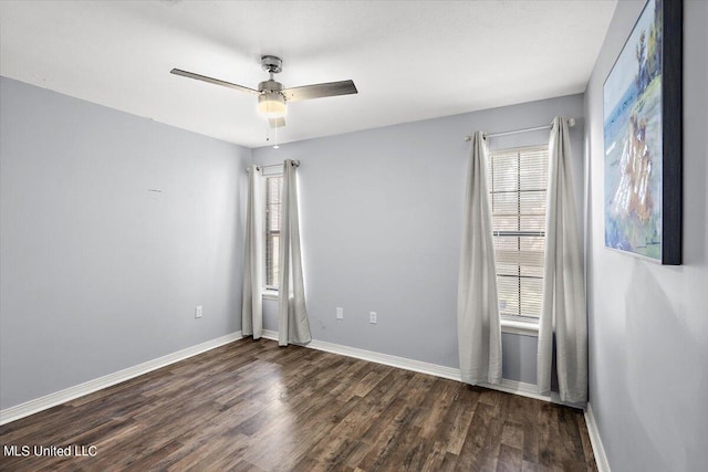 unfurnished room with dark wood-type flooring and ceiling fan