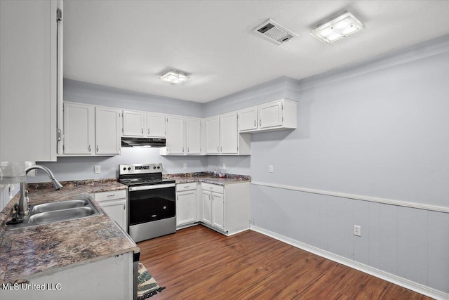 kitchen with sink, white cabinetry, dark wood-type flooring, and electric stove