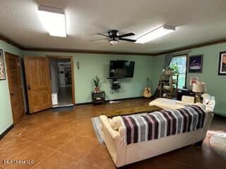 living room with ceiling fan and crown molding