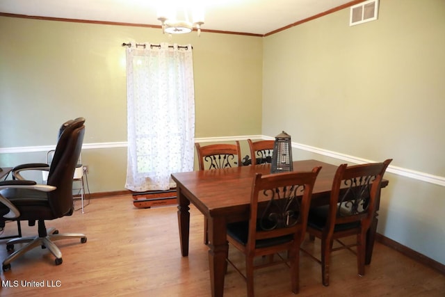 177 Robbins Rd, Brandon, MS 39042 - dining area featuring light wood-style flooring, crown molding, and an office area