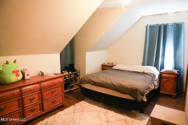 177 Robbins Rd, Brandon, MS 39042 - bedroom featuring dark wood finished floors and vaulted ceiling