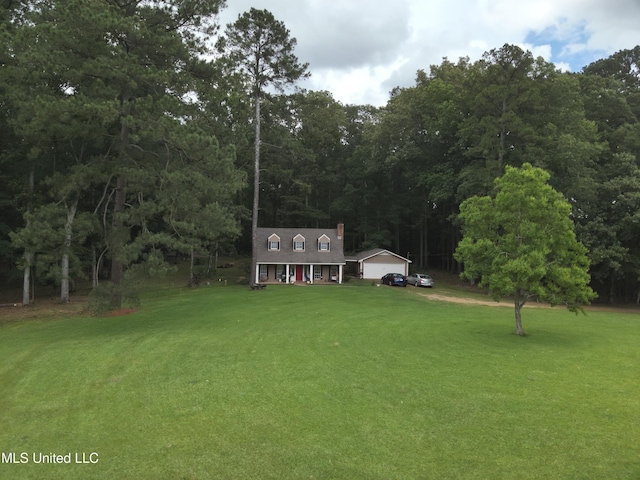 177 Robbins Rd, Brandon, MS 39042 - cape cod house with a front lawn, a view of trees, and covered porch