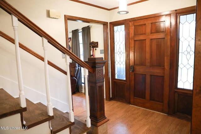 177 Robbins Rd, Brandon, MS 39042 - entrance foyer featuring stairs, light wood-style flooring, and crown molding