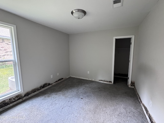 111B N Bent Creek Cir, Brandon, MS 39047 - unfurnished bedroom featuring carpet floors, a walk in closet, and a closet