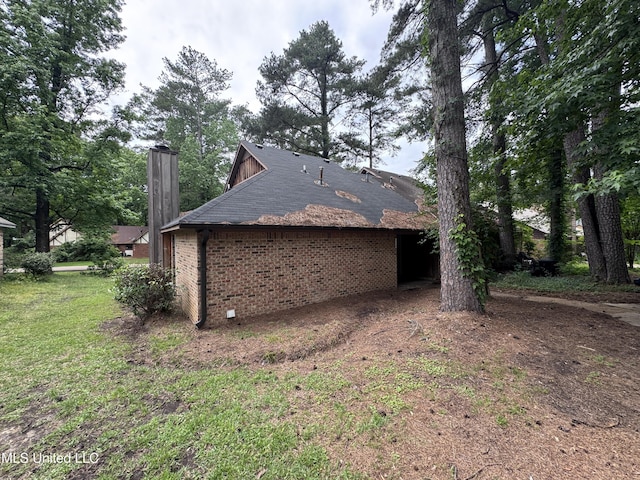 111B N Bent Creek Cir, Brandon, MS 39047 - view of side of home featuring a chimney and brick siding