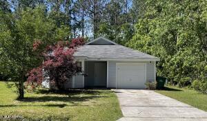6195 E Jackson St, Bay Saint Louis, MS 39520 - garage with concrete driveway