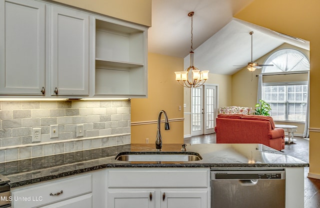 kitchen featuring lofted ceiling, a sink, open floor plan, dishwasher, and open shelves