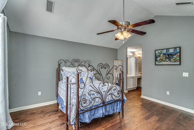 bedroom featuring dark wood-style floors, visible vents, and baseboards