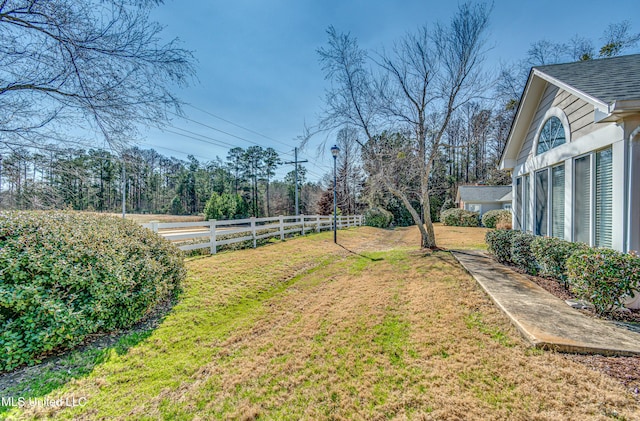 view of yard with fence