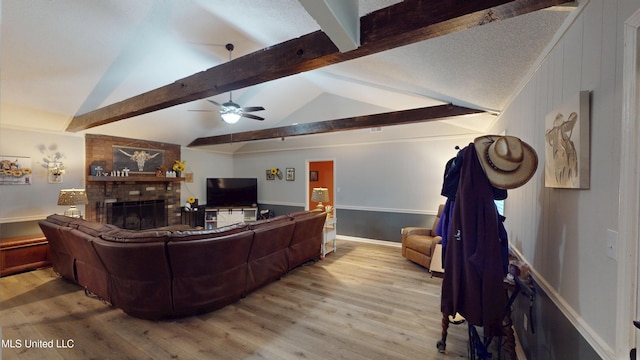 3902 S Windermere Dr, Nesbit, MS 38651 - living room featuring wood finished floors, a brick fireplace, and ceiling fan