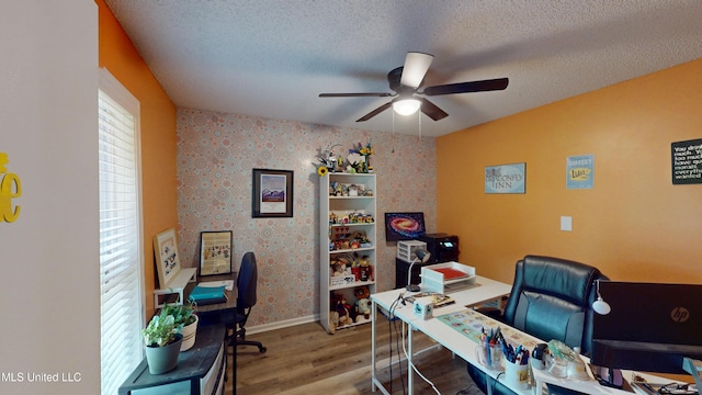3902 S Windermere Dr, Nesbit, MS 38651 - office space featuring a ceiling fan, wood finished floors, wallpapered walls, a textured ceiling, and baseboards