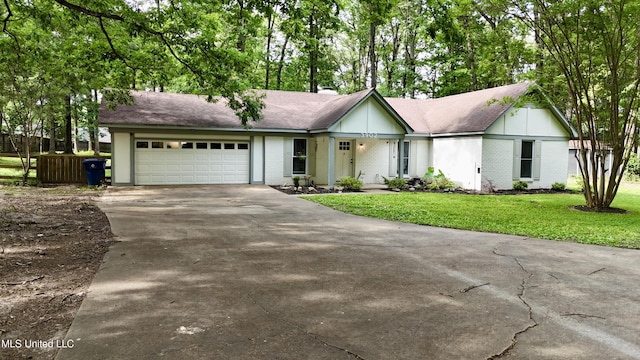 3902 S Windermere Dr, Nesbit, MS 38651 - ranch-style home featuring driveway, brick siding, and an attached garage