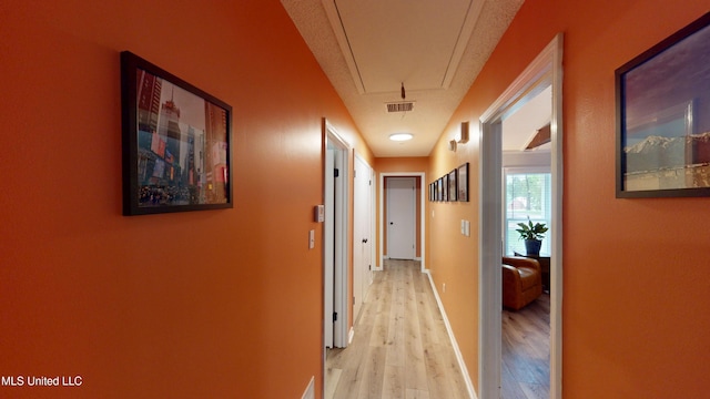 3902 S Windermere Dr, Nesbit, MS 38651 - hallway featuring attic access, light wood-style floors, and baseboards