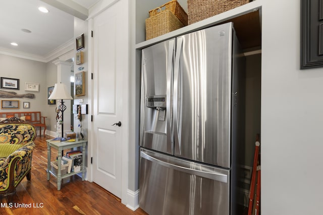 kitchen with stainless steel fridge, dark wood-style floors, ornamental molding, recessed lighting, and baseboards