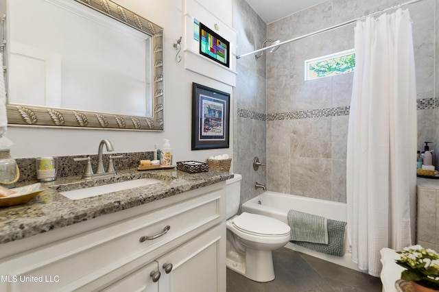 bathroom with shower / bath combination with curtain, toilet, and vanity
