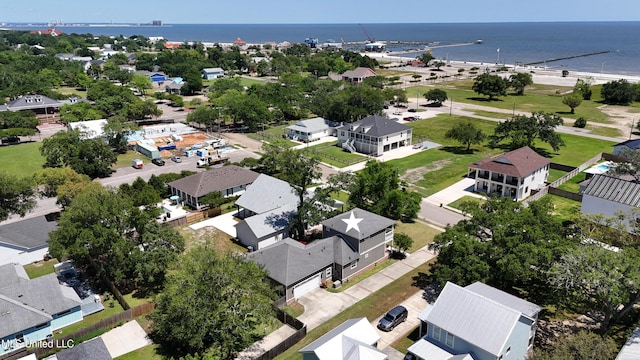 aerial perspective of suburban area featuring a large body of water