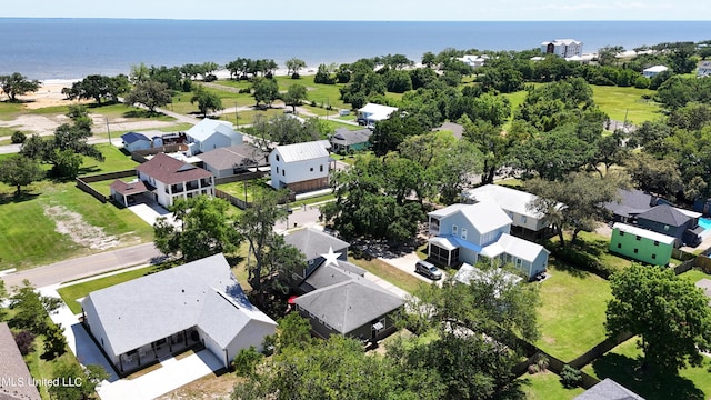 aerial perspective of suburban area featuring a large body of water