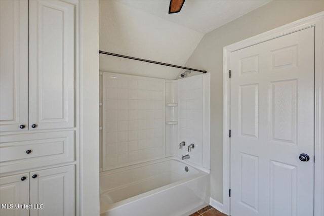 full bathroom featuring lofted ceiling and shower / bathtub combination