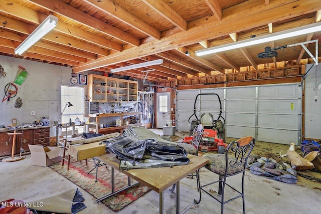 garage with a workshop area