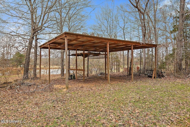 view of yard featuring a carport