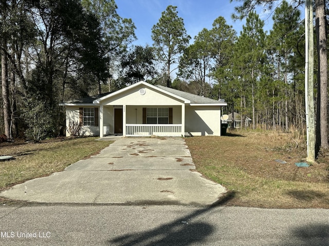 single story home featuring covered porch