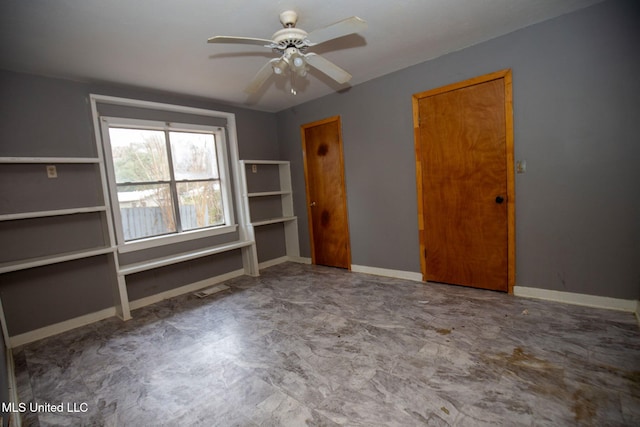 unfurnished room featuring ceiling fan