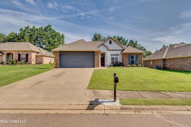 513 Willow Valley Cir, Brandon, MS 39047 - traditional-style home with a garage, a front yard, brick siding, and driveway