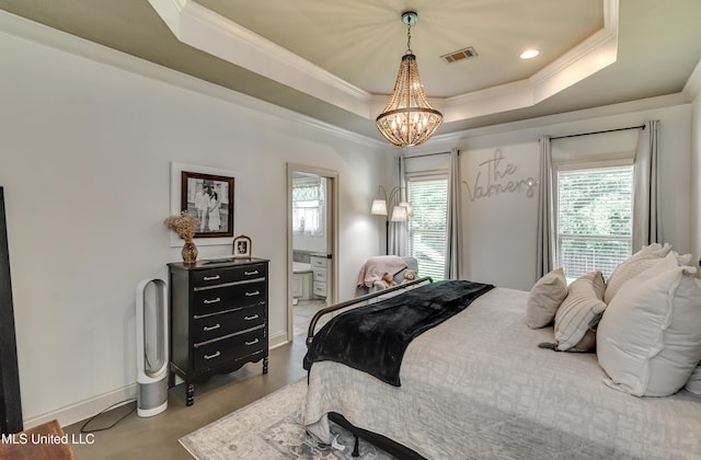 513 Willow Valley Cir, Brandon, MS 39047 - bedroom featuring crown molding, multiple windows, a chandelier, and a tray ceiling
