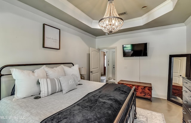 513 Willow Valley Cir, Brandon, MS 39047 - bedroom featuring ornamental molding, a chandelier, and a tray ceiling