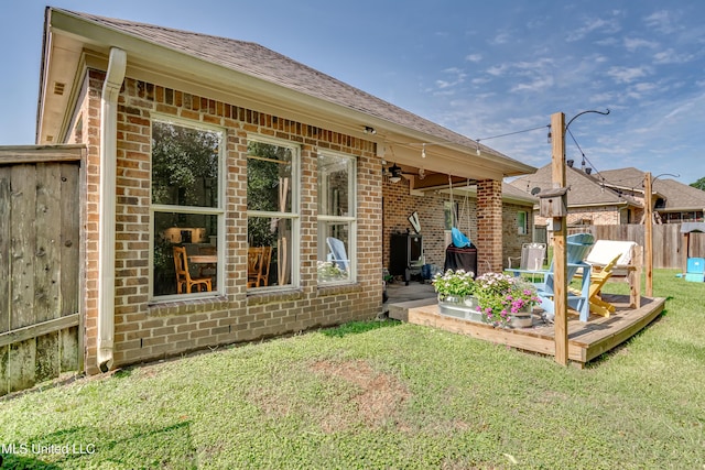 513 Willow Valley Cir, Brandon, MS 39047 - back of property with brick siding, a deck, and roof with shingles