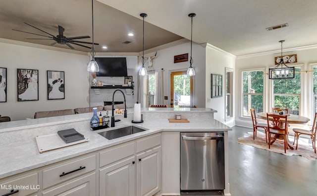 513 Willow Valley Cir, Brandon, MS 39047 - kitchen with dishwasher, open floor plan, ornamental molding, white cabinets, and finished concrete flooring