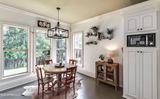 513 Willow Valley Cir, Brandon, MS 39047 - dining room with a chandelier, ornamental molding, and dark wood finished floors