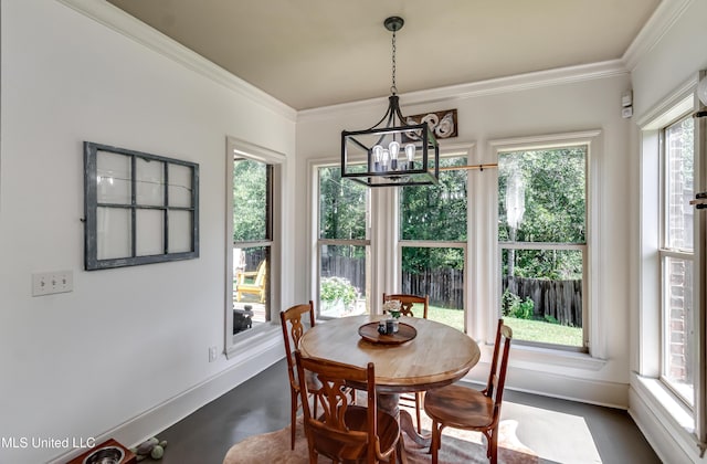 513 Willow Valley Cir, Brandon, MS 39047 - dining area featuring a chandelier and ornamental molding
