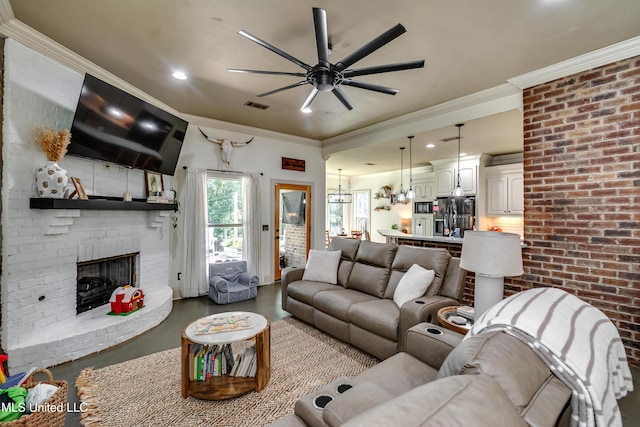 513 Willow Valley Cir, Brandon, MS 39047 - living room with ceiling fan, a fireplace, crown molding, concrete flooring, and recessed lighting