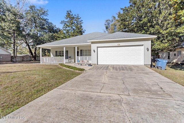 single story home featuring covered porch, a garage, and a front lawn