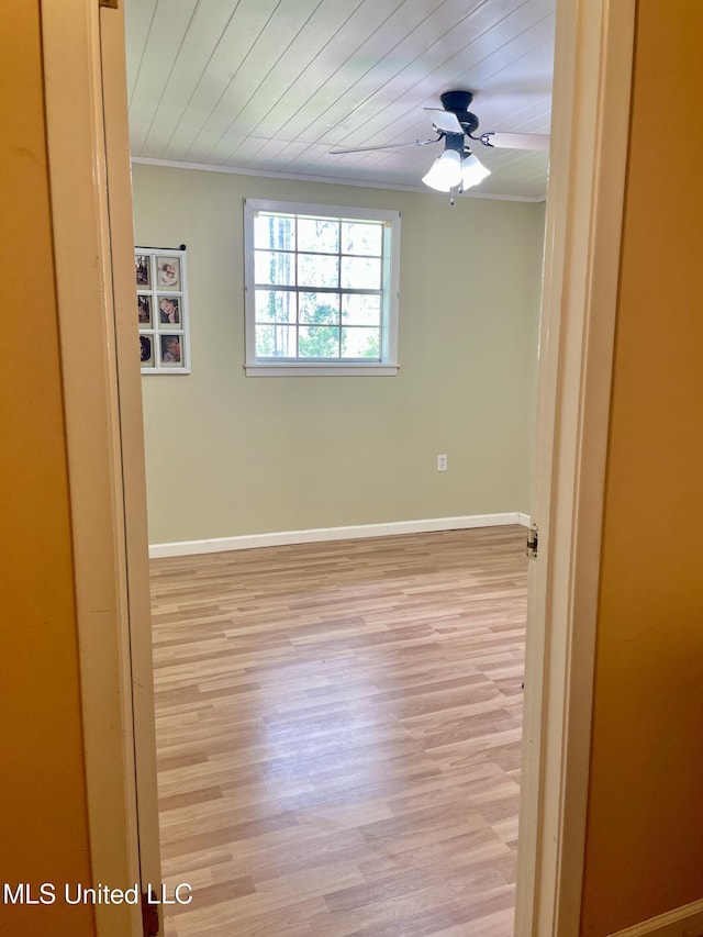 302 Mulberry Ln, Quitman, MS 39355 - unfurnished room with light wood-type flooring, crown molding, wooden ceiling, and ceiling fan