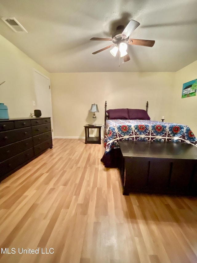 302 Mulberry Ln, Quitman, MS 39355 - bedroom featuring wood finished floors and ceiling fan