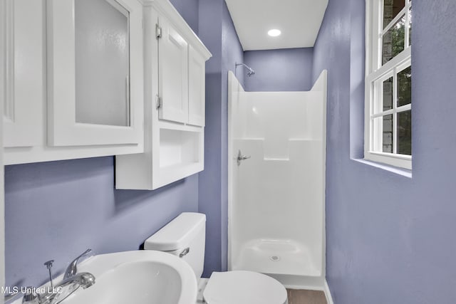 2713 Brazil St, Pascagoula, MS 39581 - full bathroom with toilet, a sink, and a walk in shower