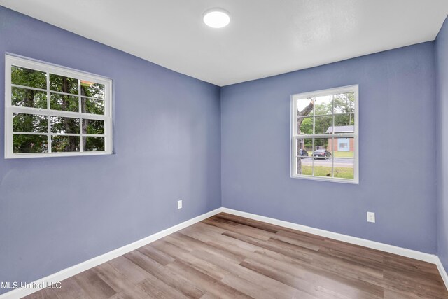 2713 Brazil St, Pascagoula, MS 39581 - spare room featuring baseboards and wood finished floors