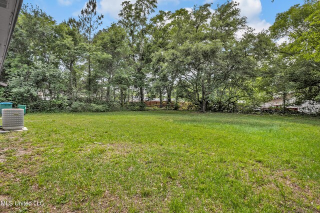 2713 Brazil St, Pascagoula, MS 39581 - view of yard with central air condition unit and fence