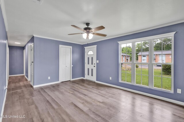 2713 Brazil St, Pascagoula, MS 39581 - entryway featuring wood finished floors, ceiling fan, and baseboards