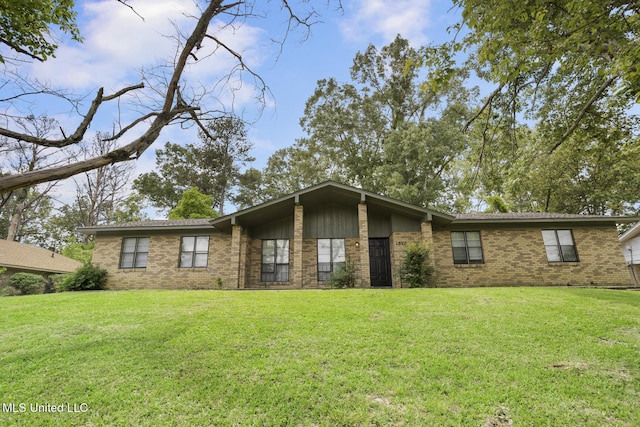 1512 Arlington St, Clinton, MS 39056 - view of front of property with a front yard and brick siding